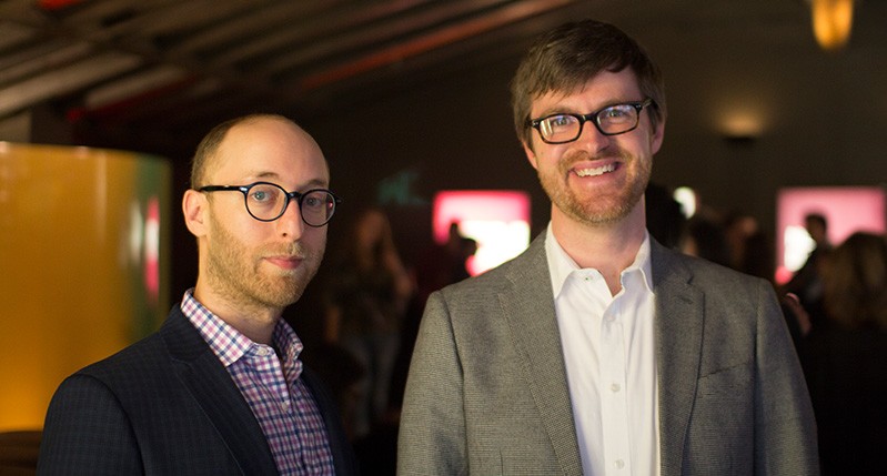 two men with glasses