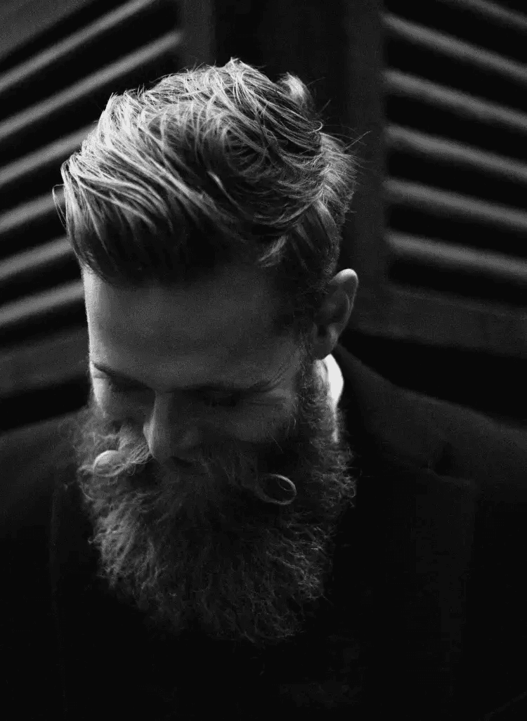 people in a large building with Tate Modern in the background