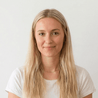 man standing in front of window