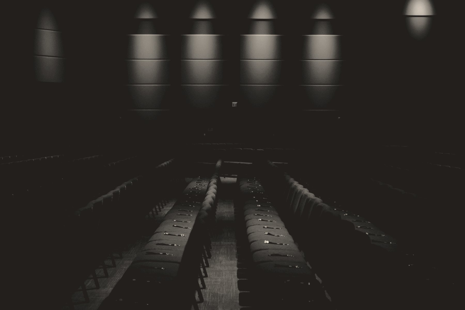 Rows of red theatre seats