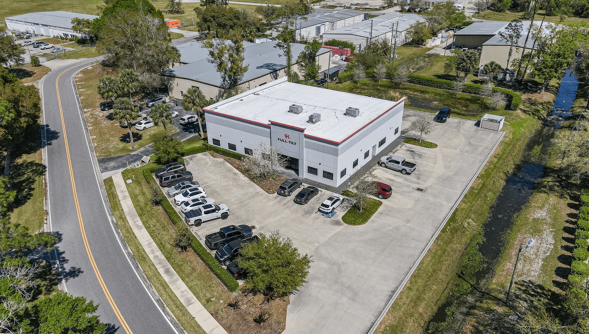 An aerial photosgraph of an industrial flex property, with the business name Full Tilt above the main entrance.