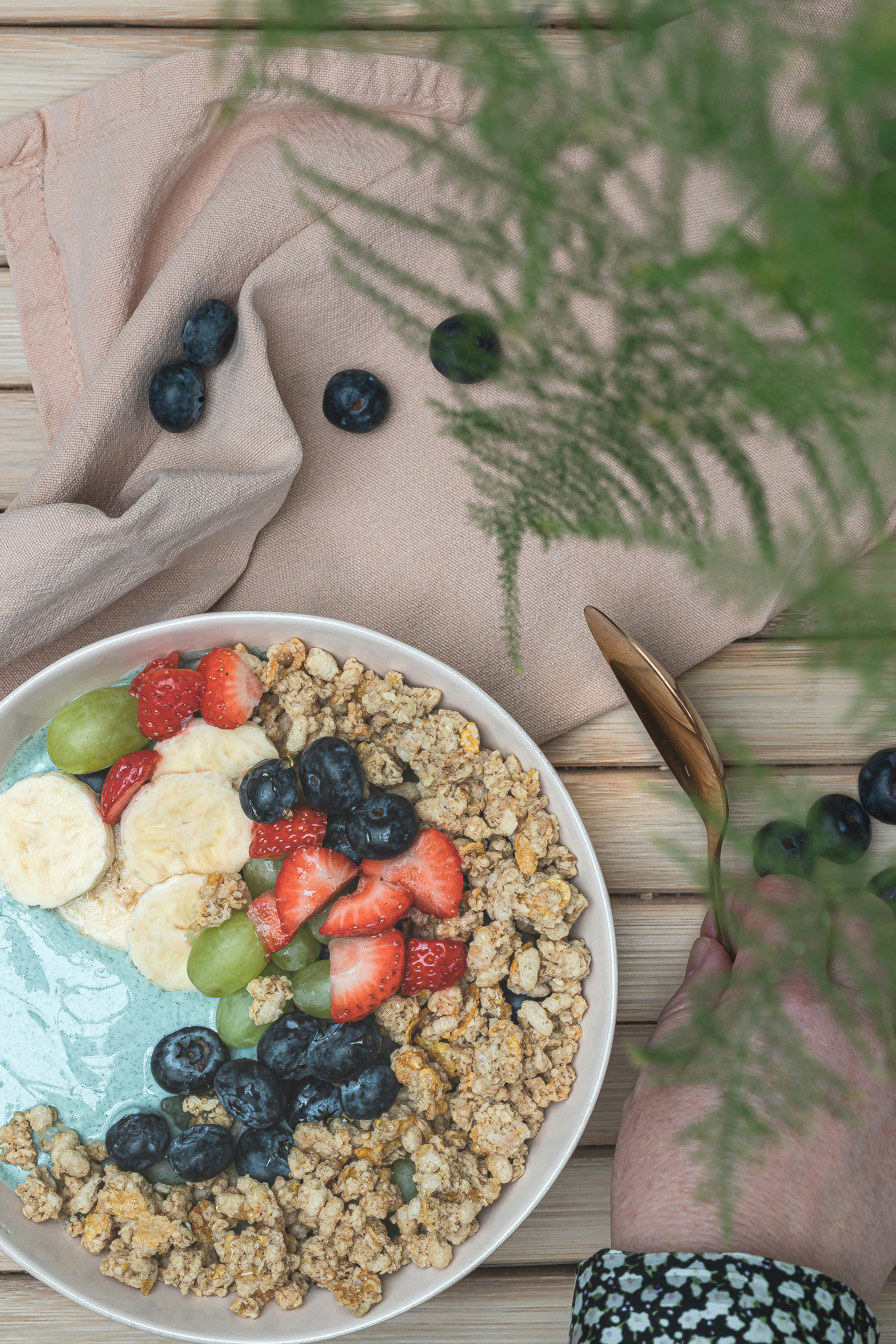 a bowl of cereal with fruit and yogurt