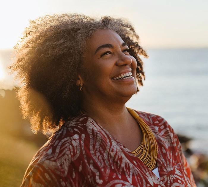smiling woman outside
