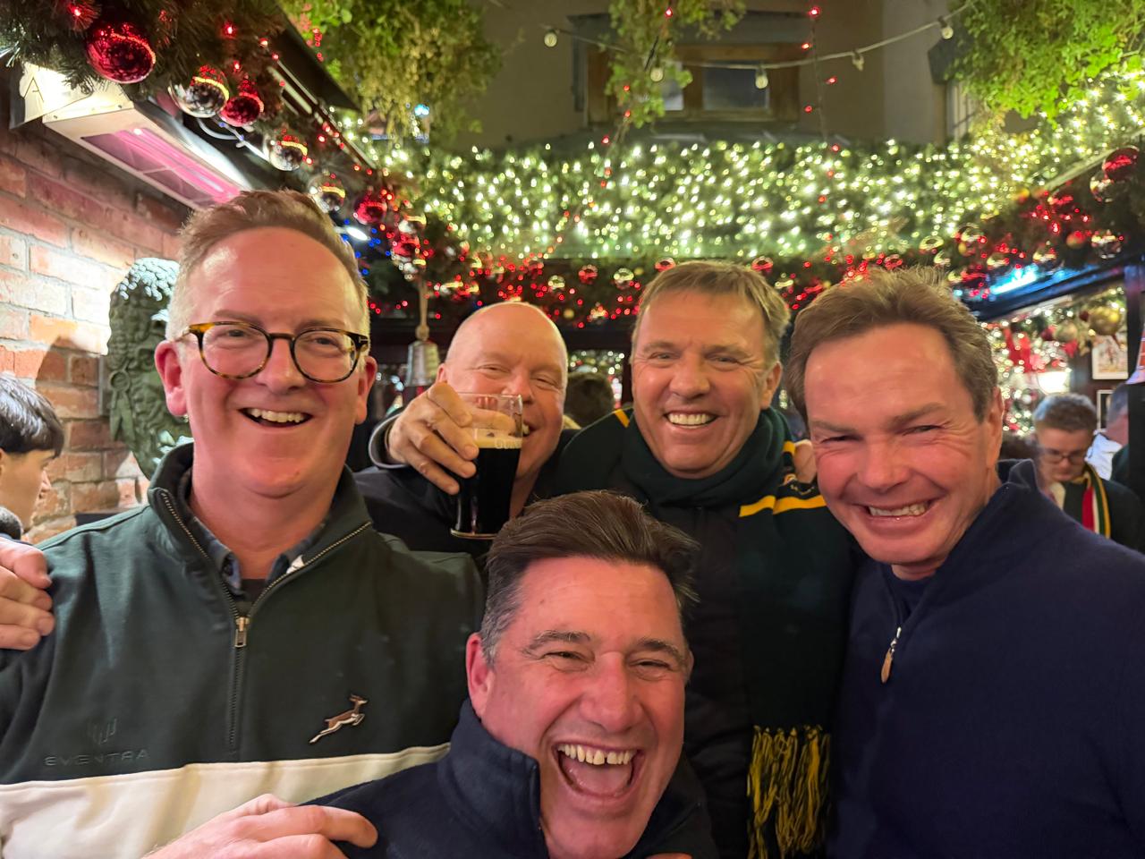 Image of eben etzebeth on stage at an eventra group event