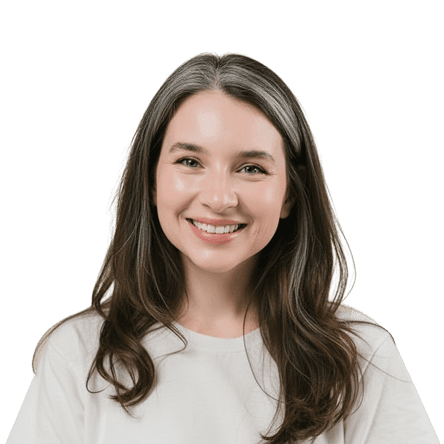Smiling woman with long, wavy brown hair and gray streaks.