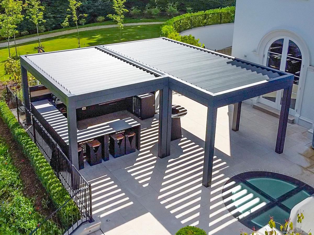 Poolside outdoor lounge beneath a pergola