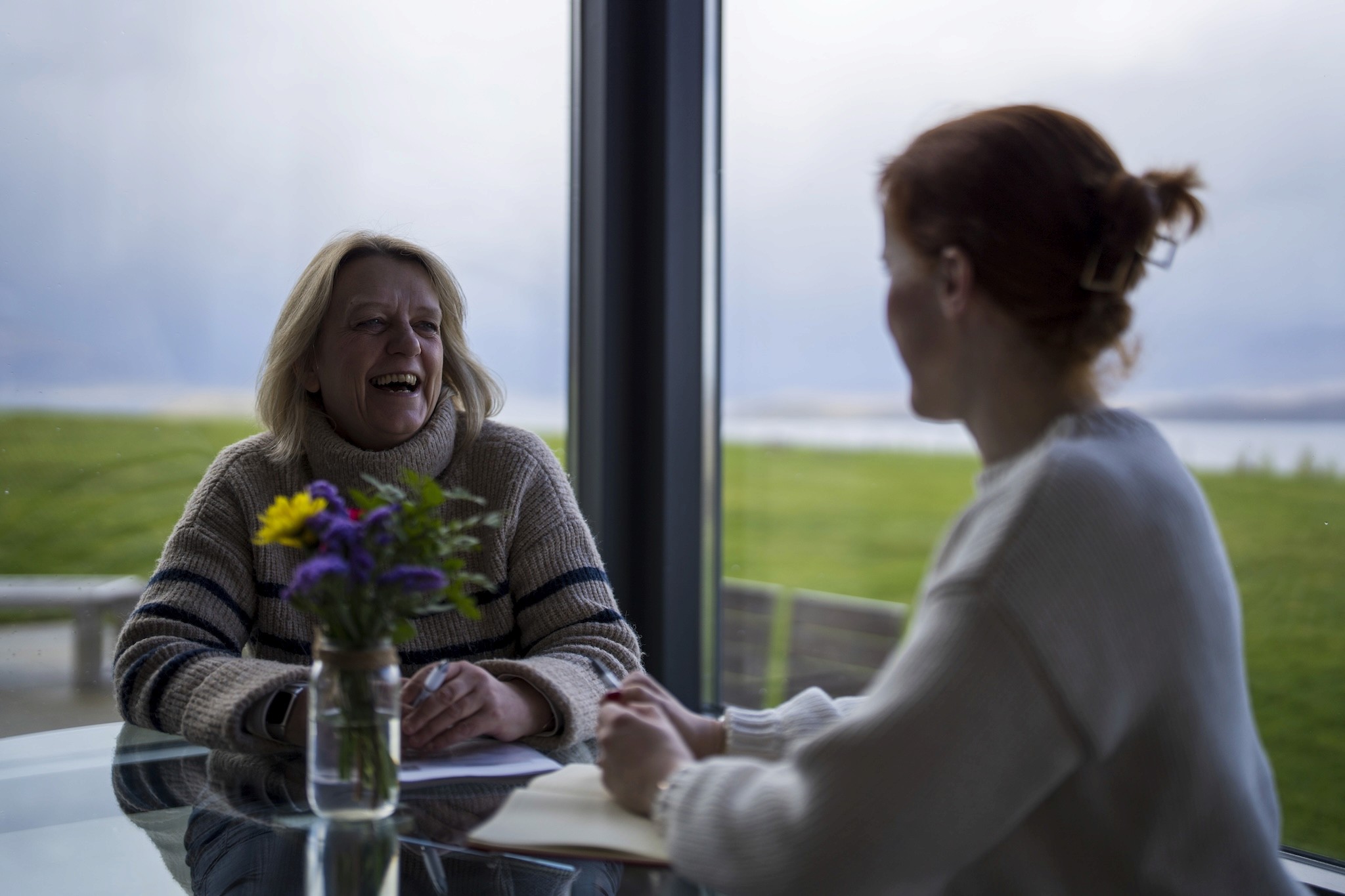 a close up of a scrabble type word that says change