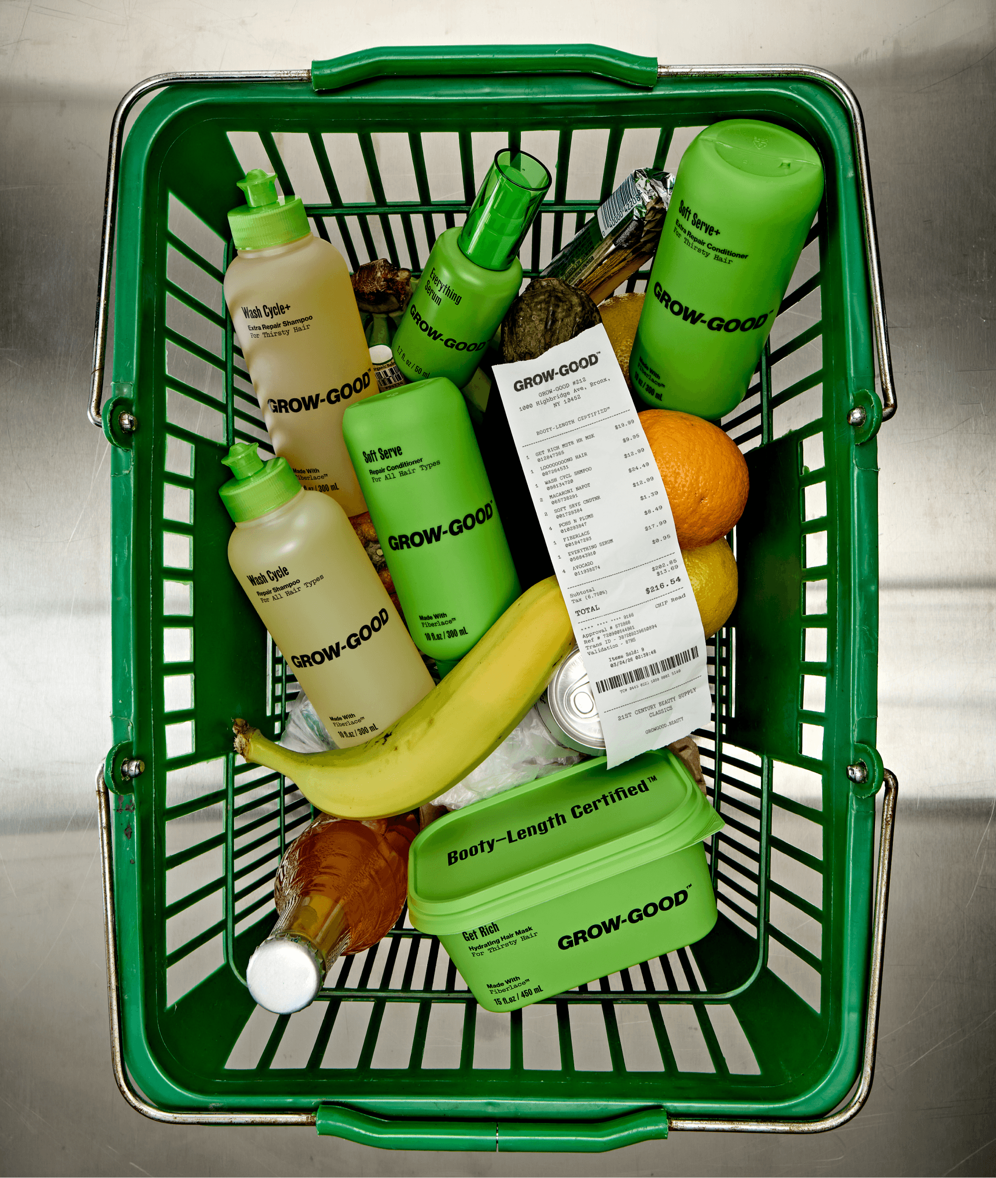 Grow-Good Beauty full product range styled in green grocery basket with receipt and produce