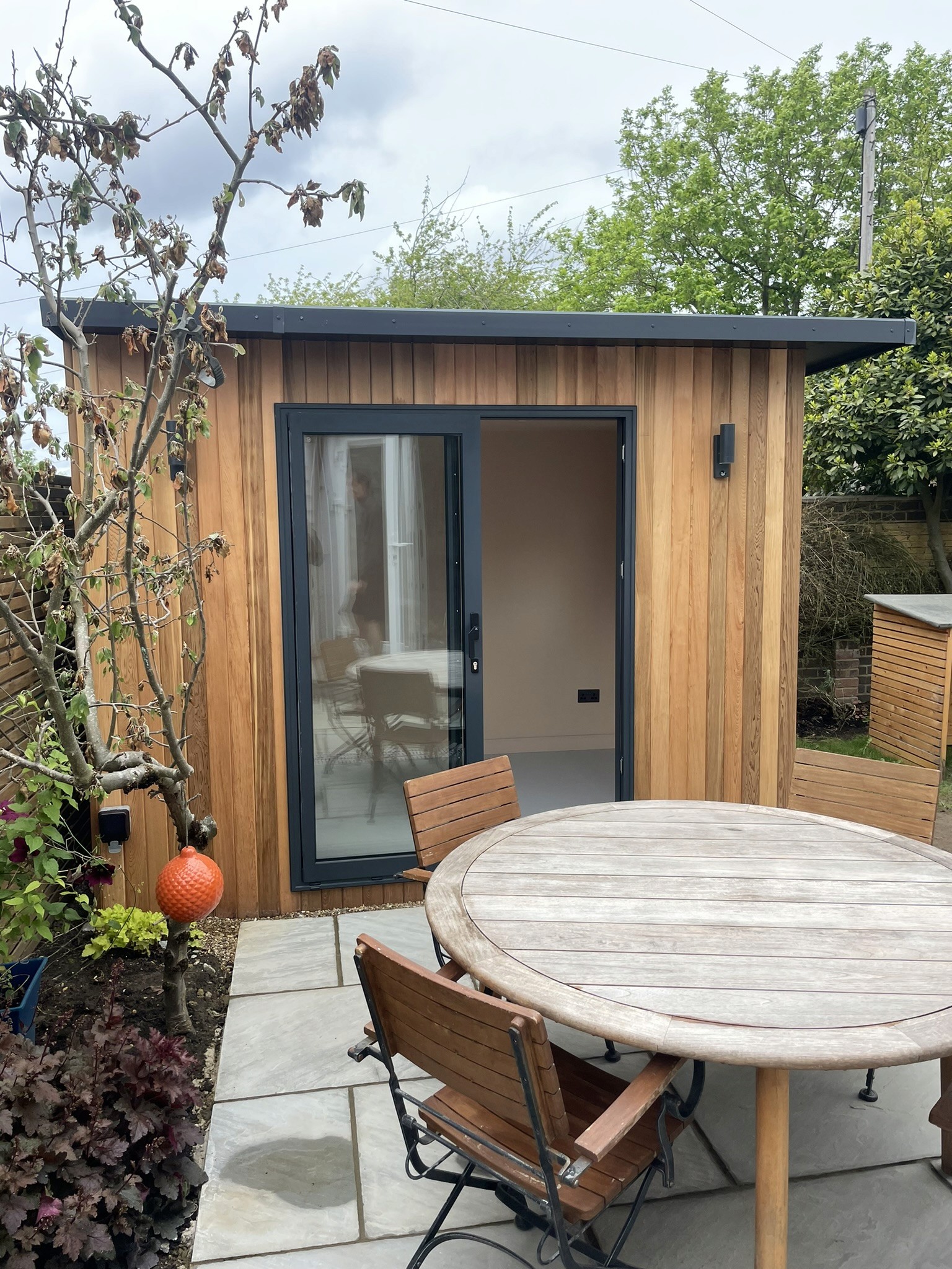 Small Cedar Office in Gypsy Hill. Western red cedar tongue and groove garden room by Eleven Trees.