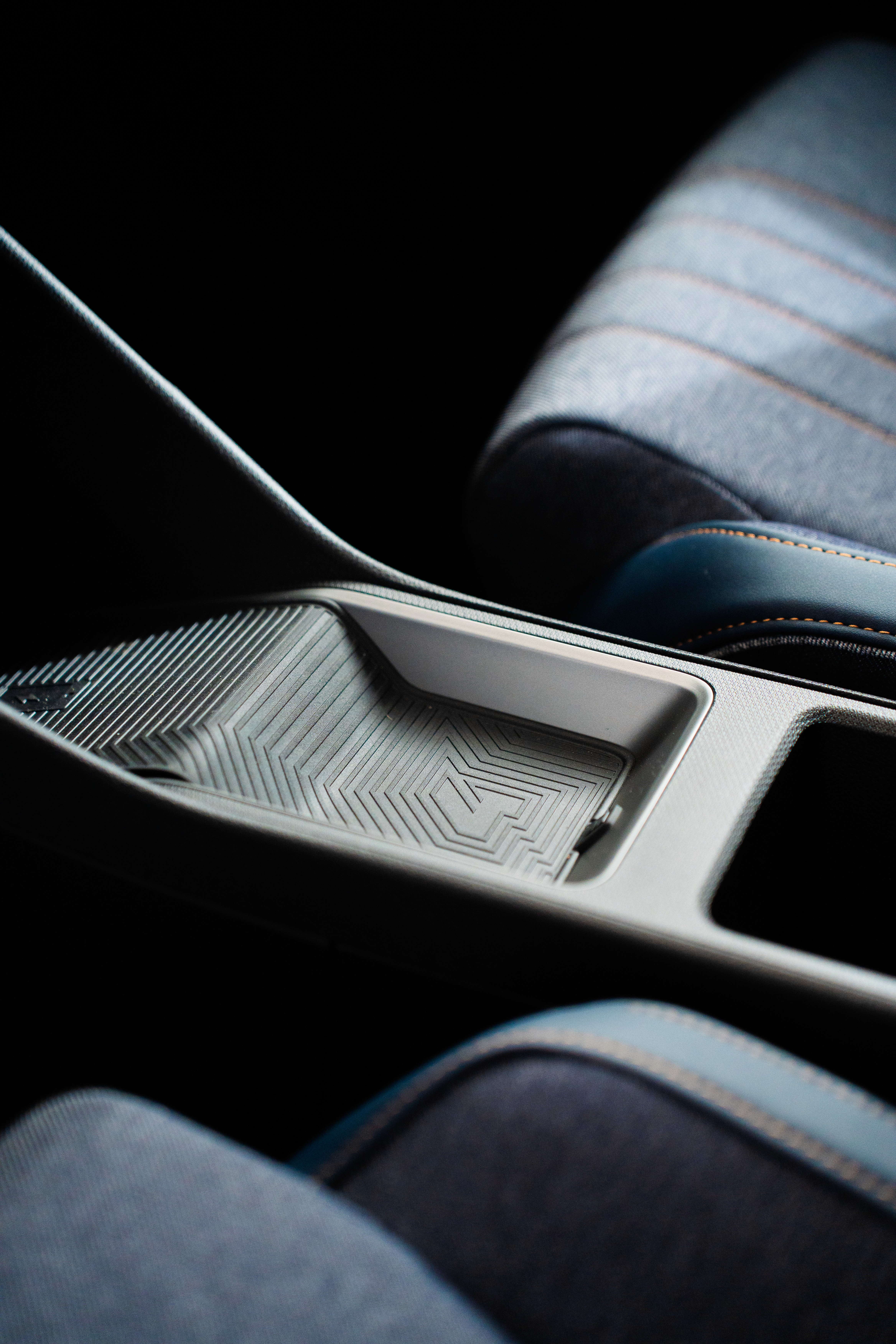  A woman in a helmet with a light trail, suggesting movement or speed in a dynamic outdoor setting.