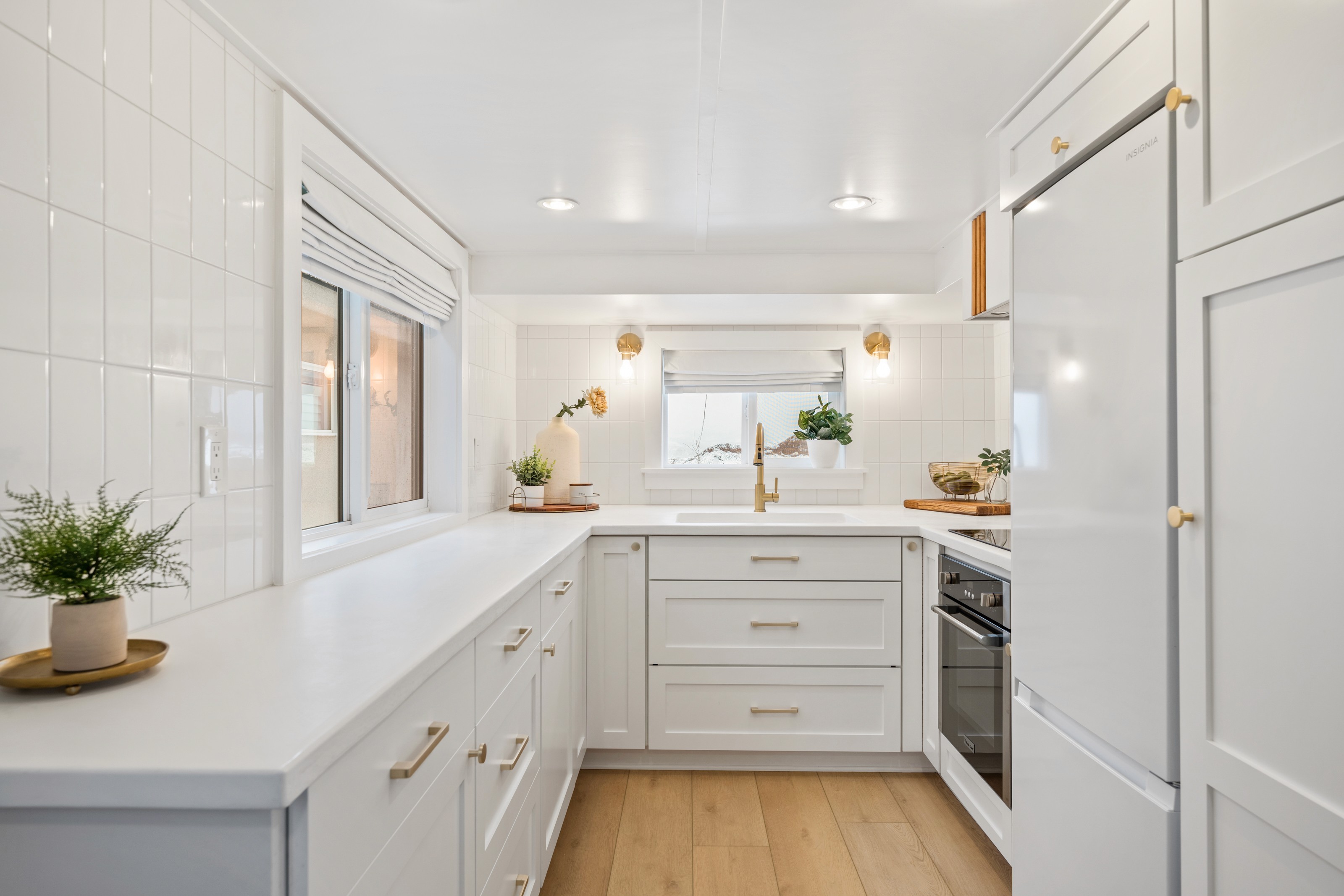 Great room in a St. George, Utah home featuring 70s-style wood accents, fireplace, and warm, inviting design