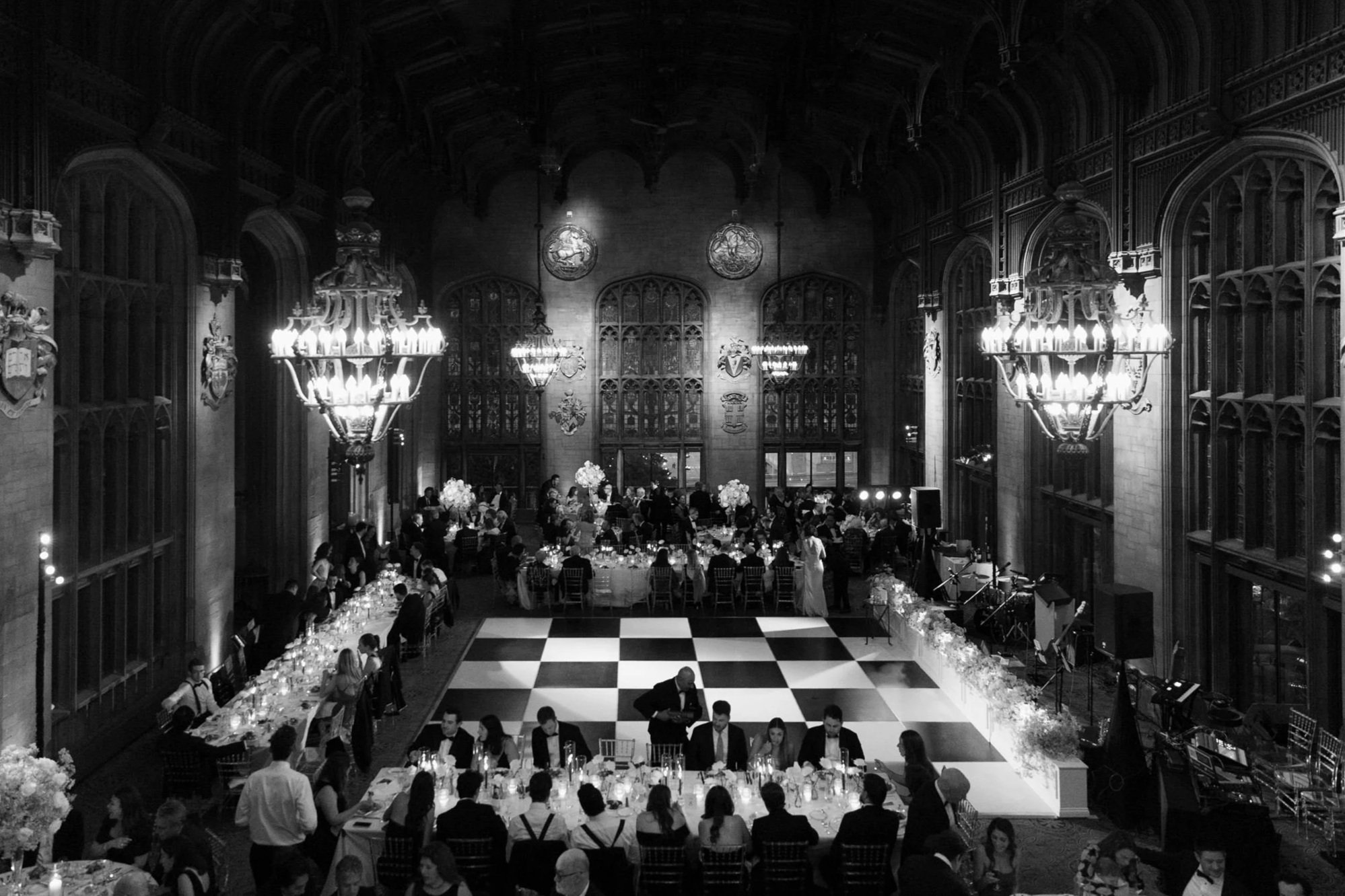 University Club of Chicago wedding ceremony in a historic cathedral-style hall with stained glass and vaulted ceilings