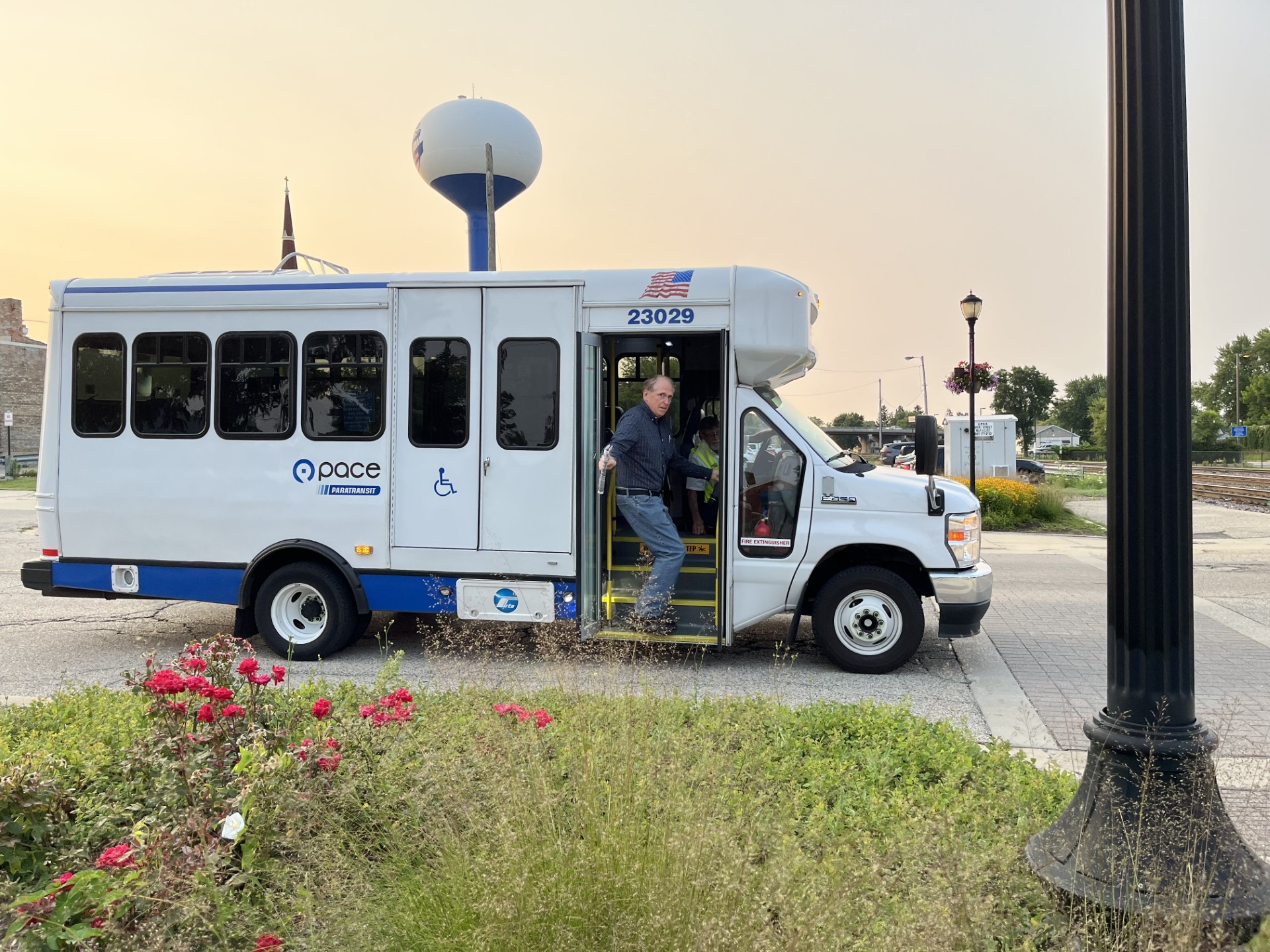 Scott Summers catching a ride on the PACE paratransit bus