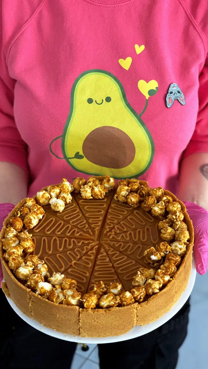 a person swimming in the water with grass