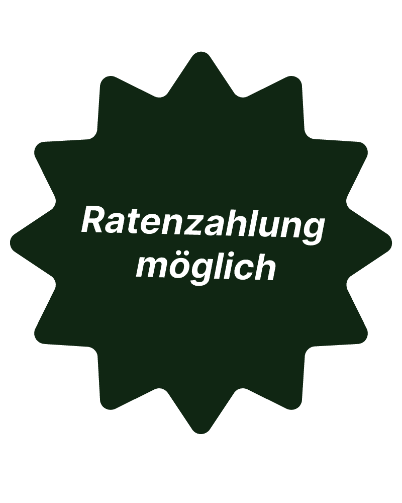 Portrait of a curly-haired man in a rust-and-white striped knit sweater under a clear blue sky—modern fashion look.