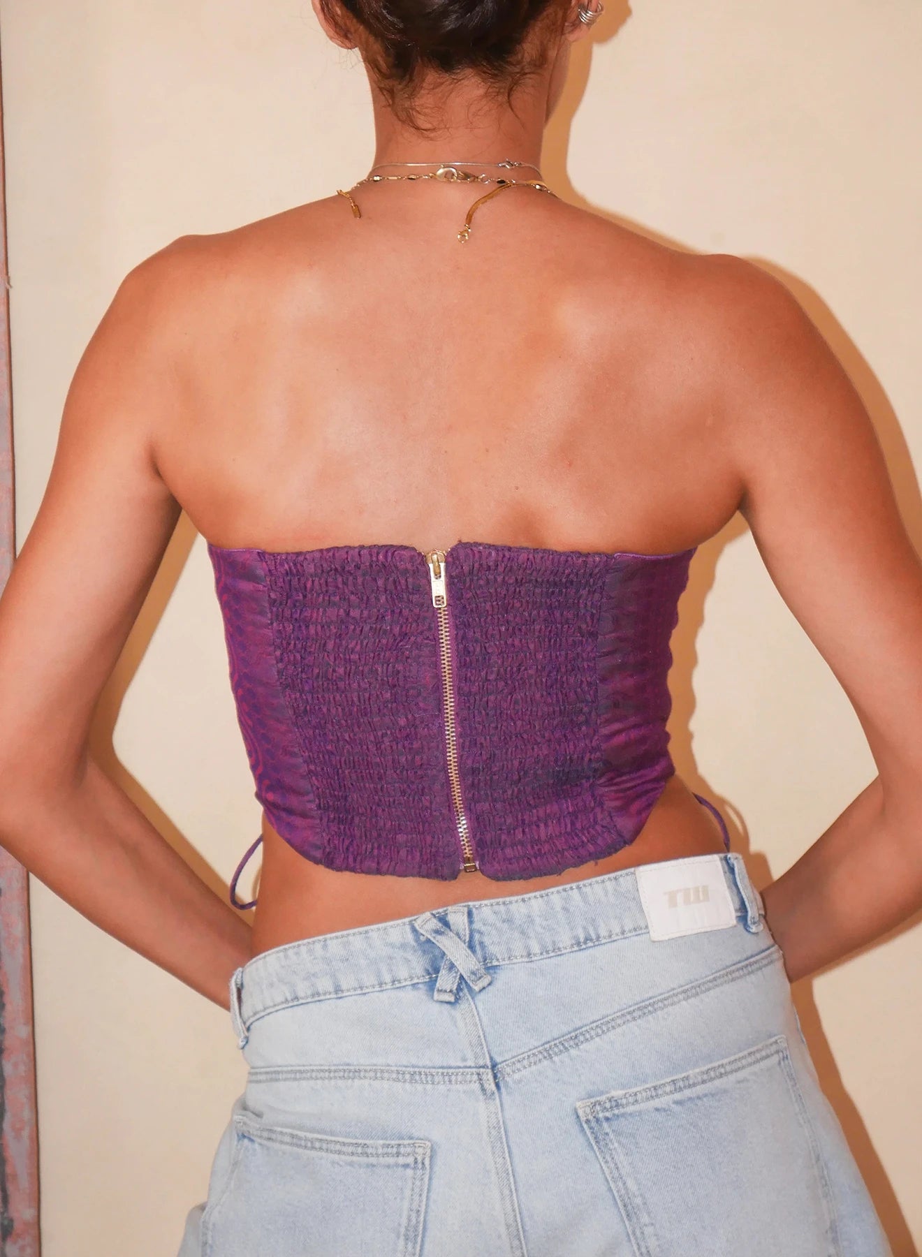 SAHIRA paisley silk corset handcrafted from vintage saree with lace-up panels, smocked back and metal zipper.