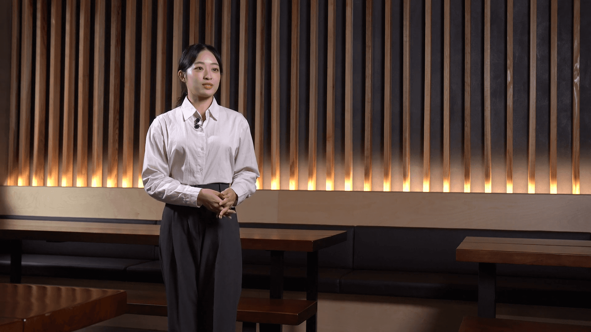 gray Nest thermostat displaying at 63