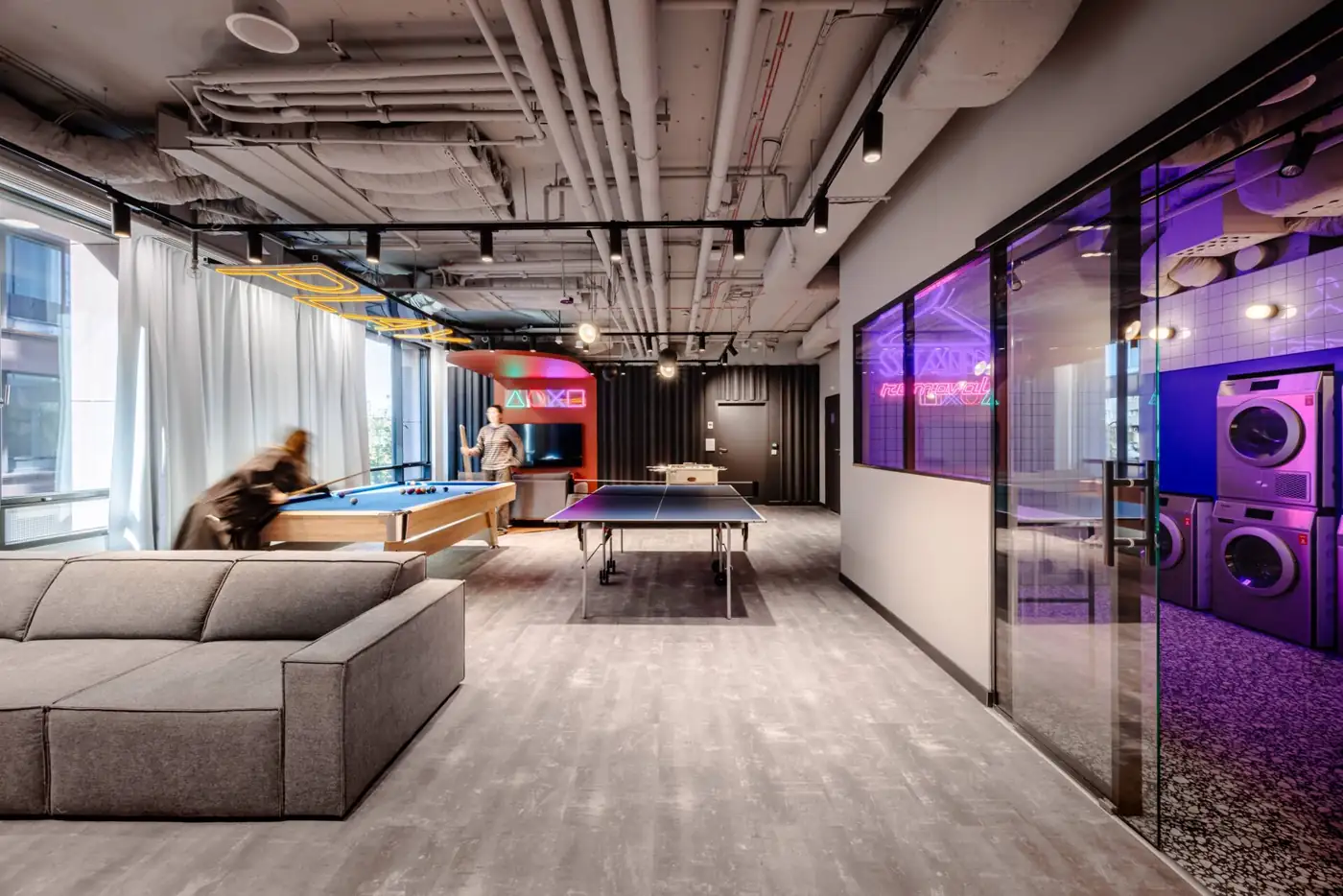Games room with pool and table tennis in student accommodation in Warsaw