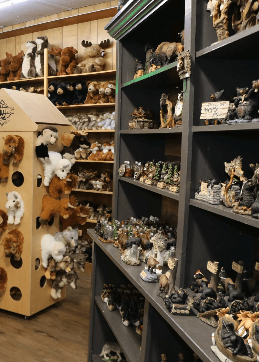 mountain valley with green grass and little village in the middle