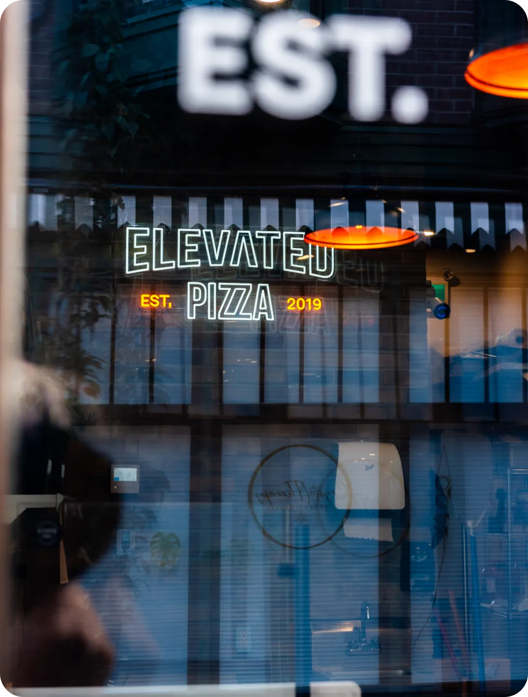 Elevated Pizza restaurant signage