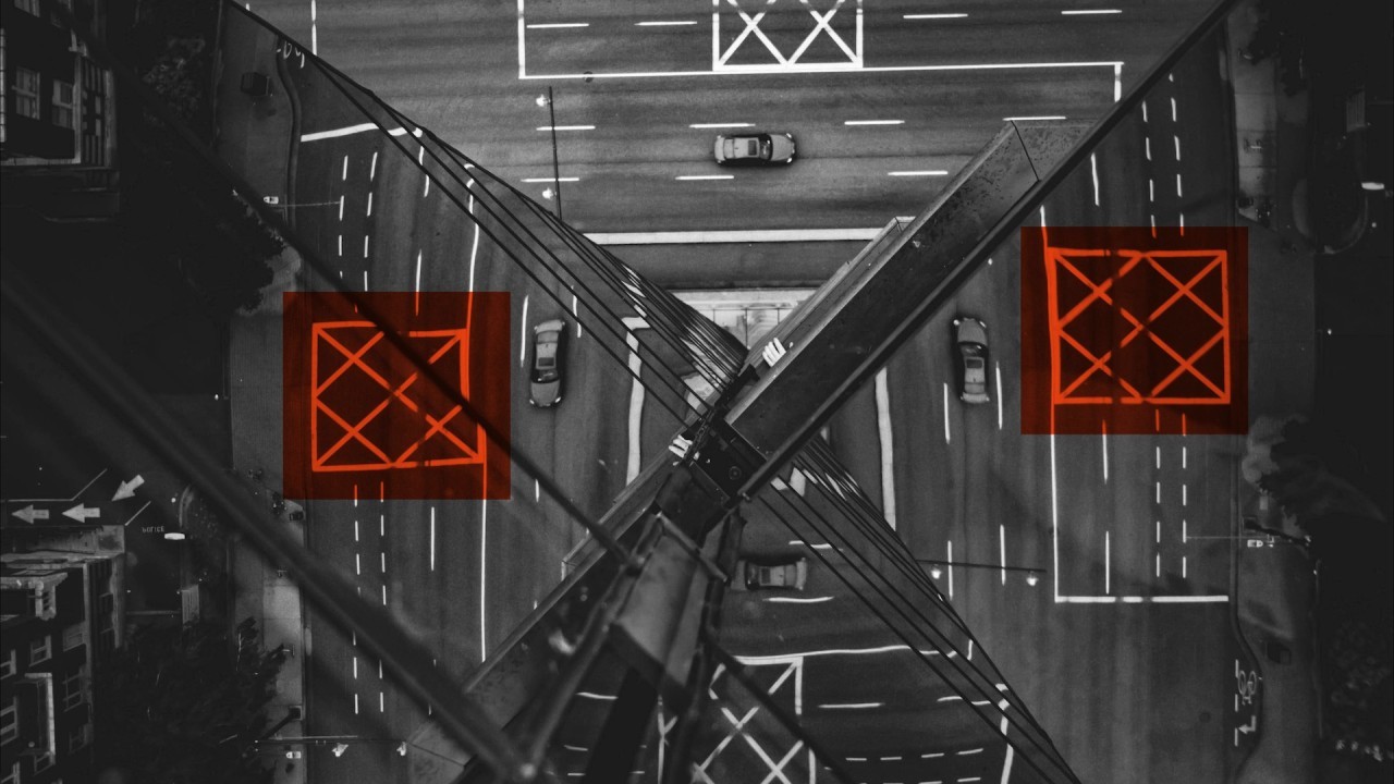 Cars moving around a square roundabout