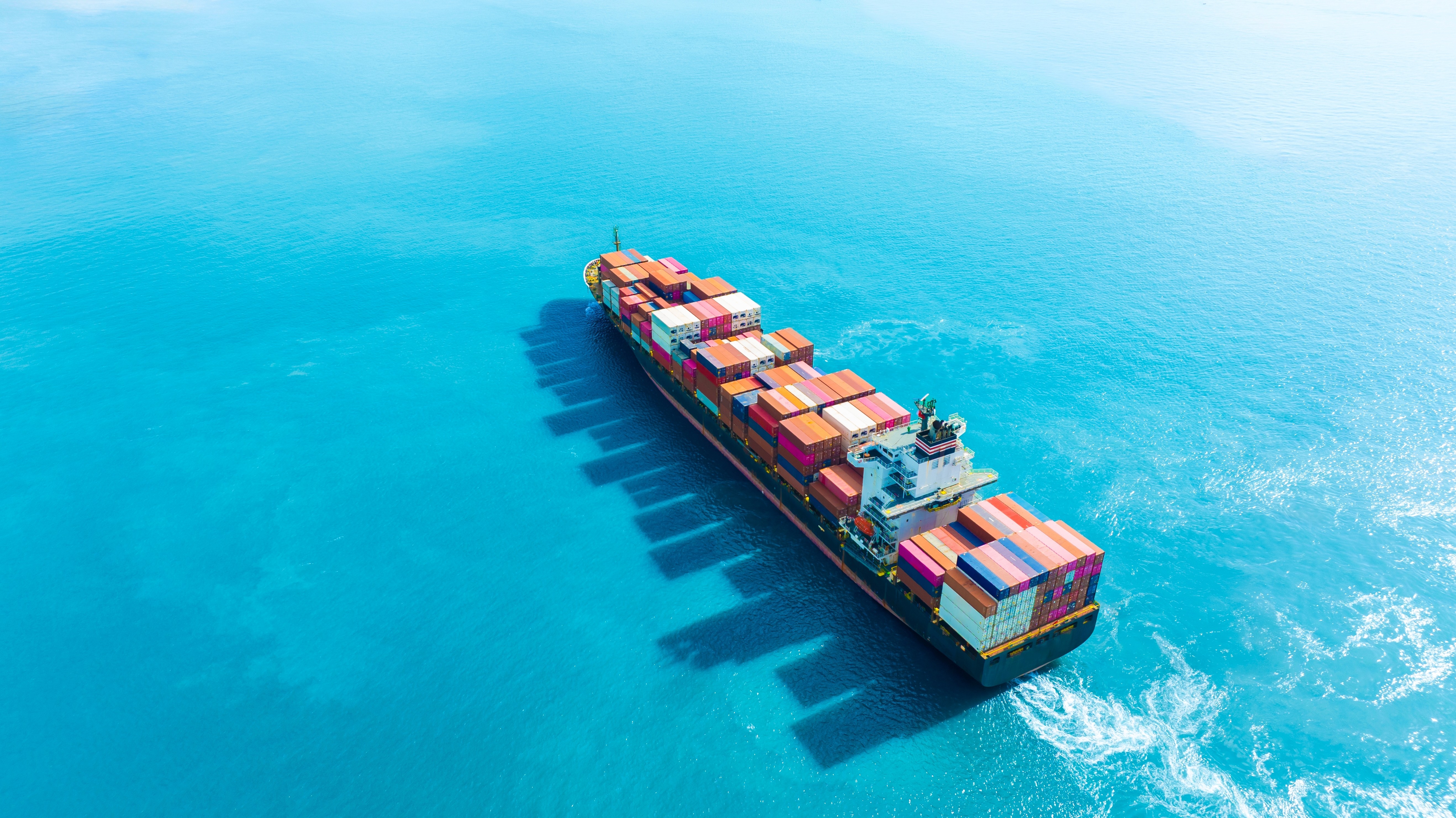 Minimalist coffee can design in hand – black and white packaging with bold typography