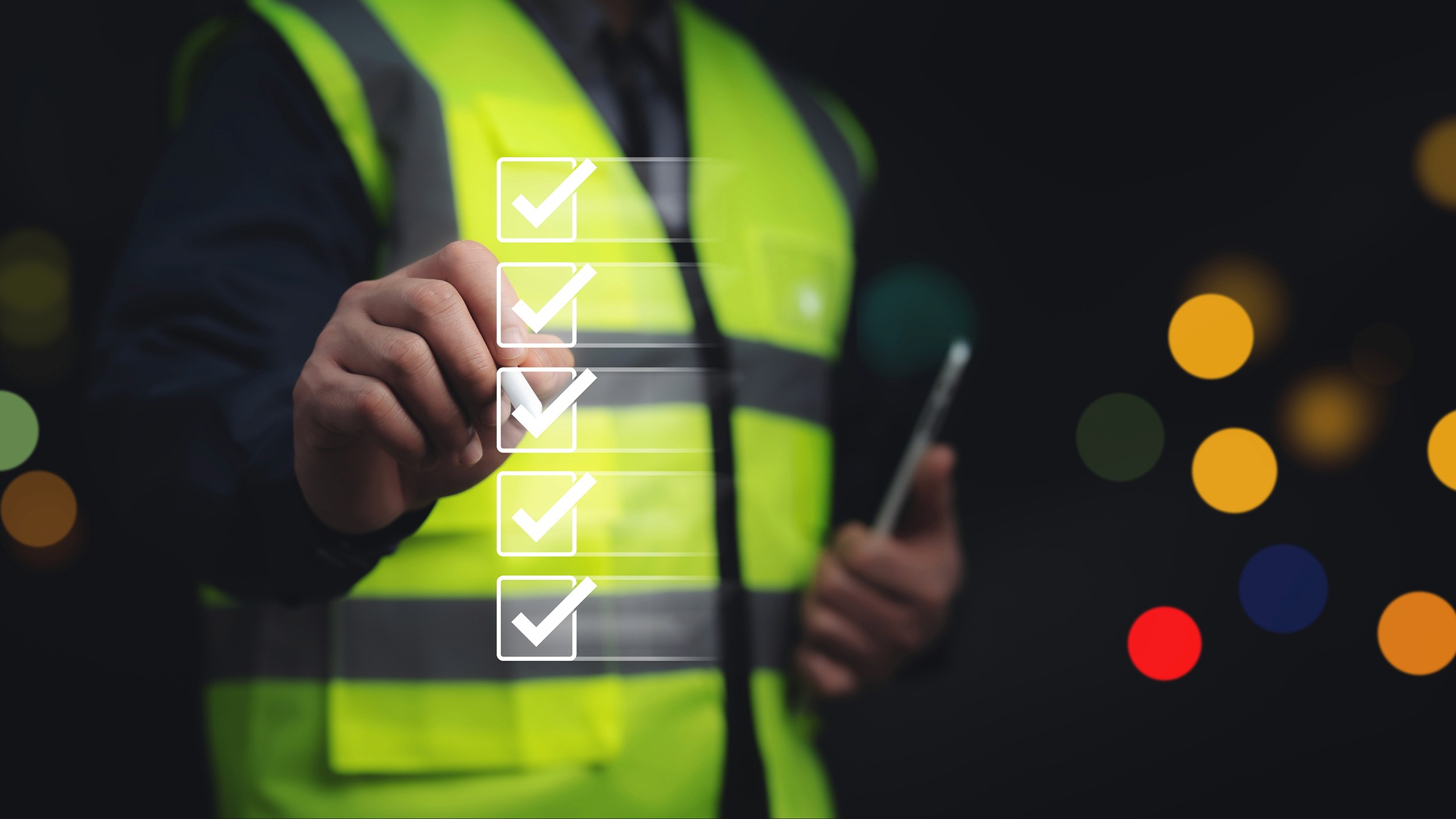 Engineer verifying a digital checklist on a construction site. Safety inspection process enhances project quality and operational standards