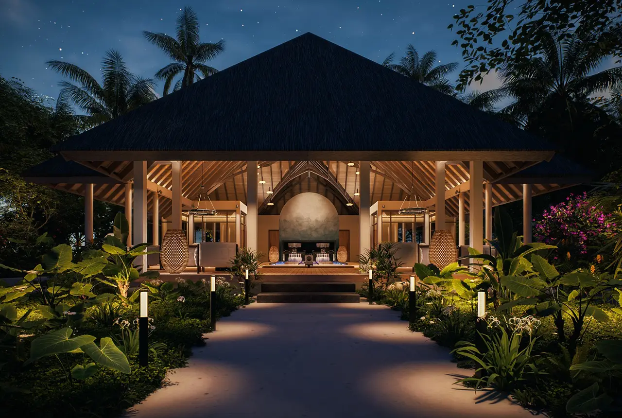 Nachtaufnahme eines luxuriösen Resorts mit einem holzbasierten Gebäude, das von exotischen Pflanzen und Lichtern umgeben ist.
