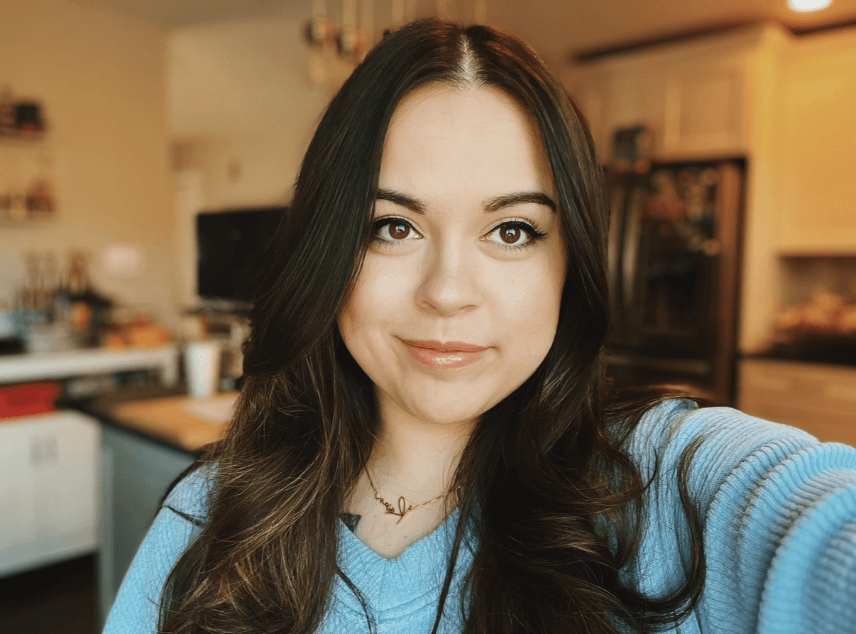 Cheerful dreamy woman with bob hairstyle