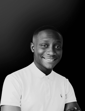 woman in black blazer standing