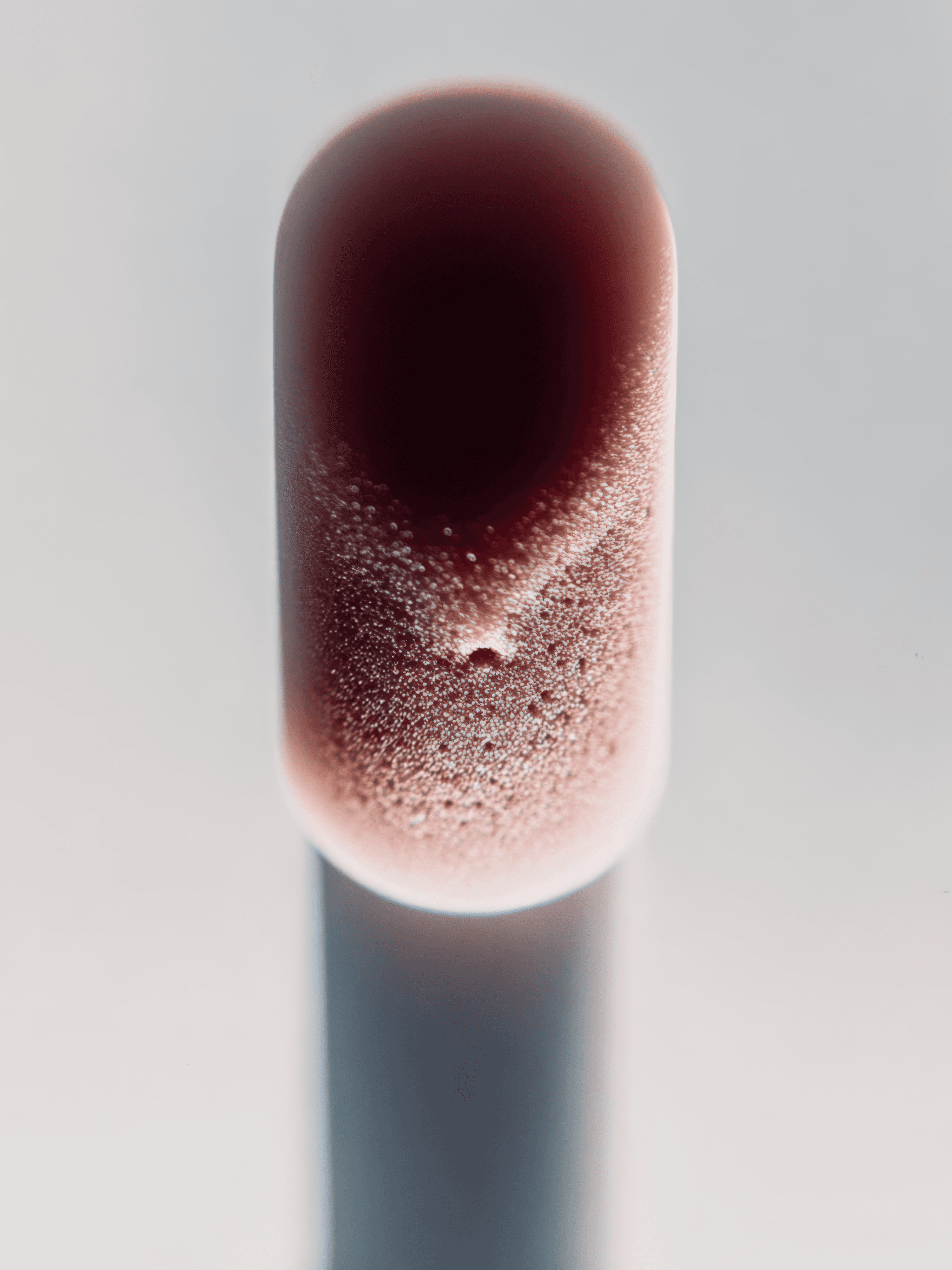 Lone tree silhouette against a vibrant sunset sky