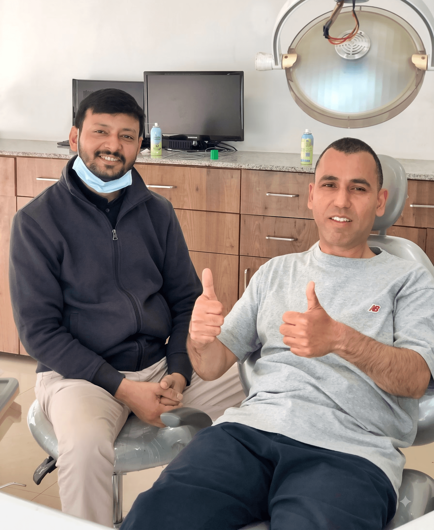 A healthcare professional in a white uniform and face mask gives two thumbs up, conveying positivity and assurance, against a neutral background.