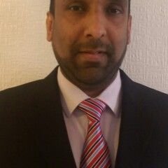 woman in white crew neck shirt smiling