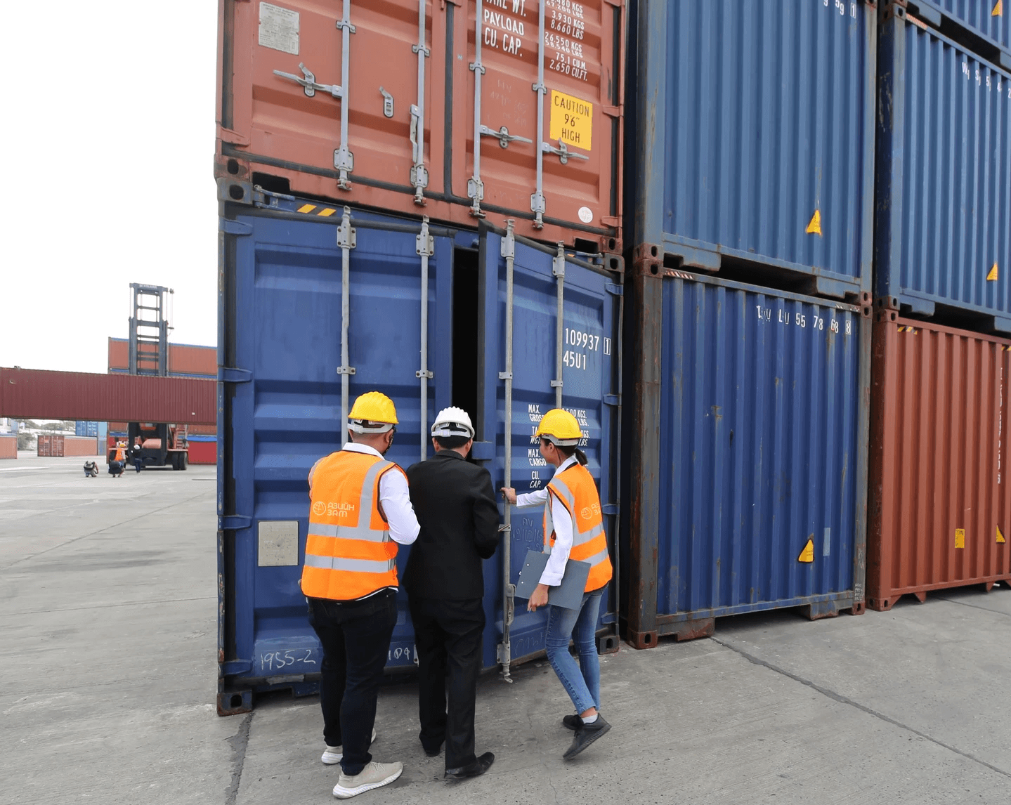 man wearing suit with laptop