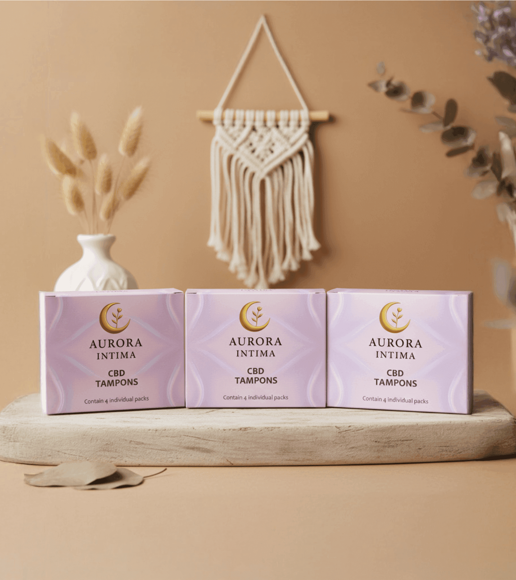 a bundle of 3 boxes of Aurora Intima Special Tampons that relief pain during menstruation