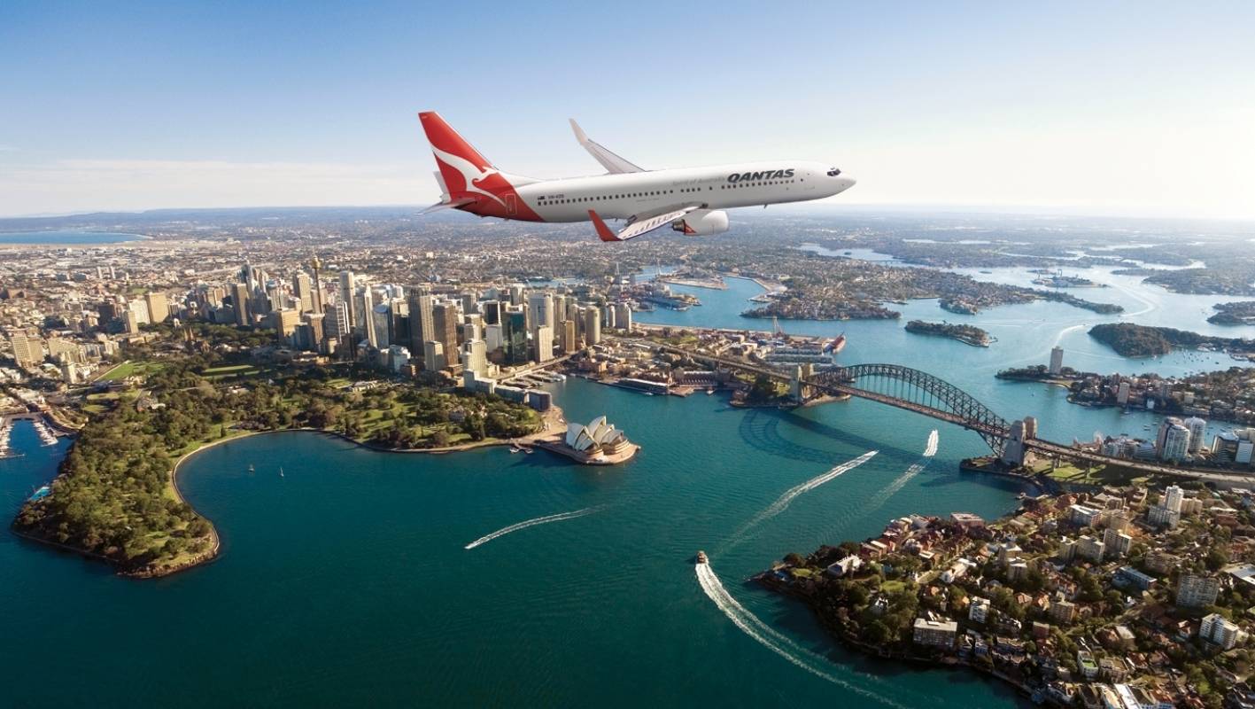 Qantas plane over Sydney Harbour