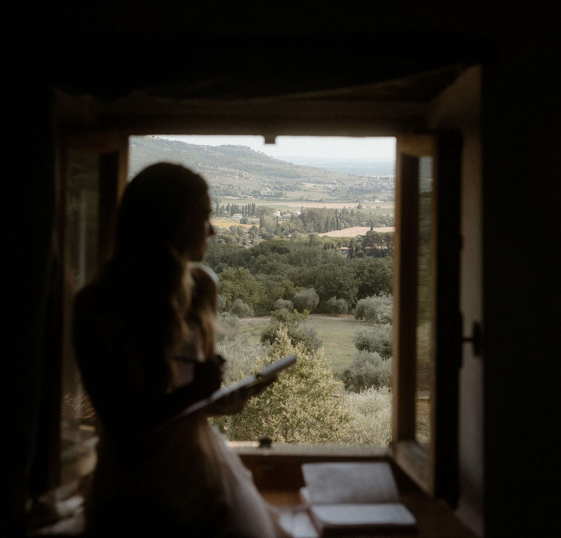Bride and groom smiling and crying during their ceremony