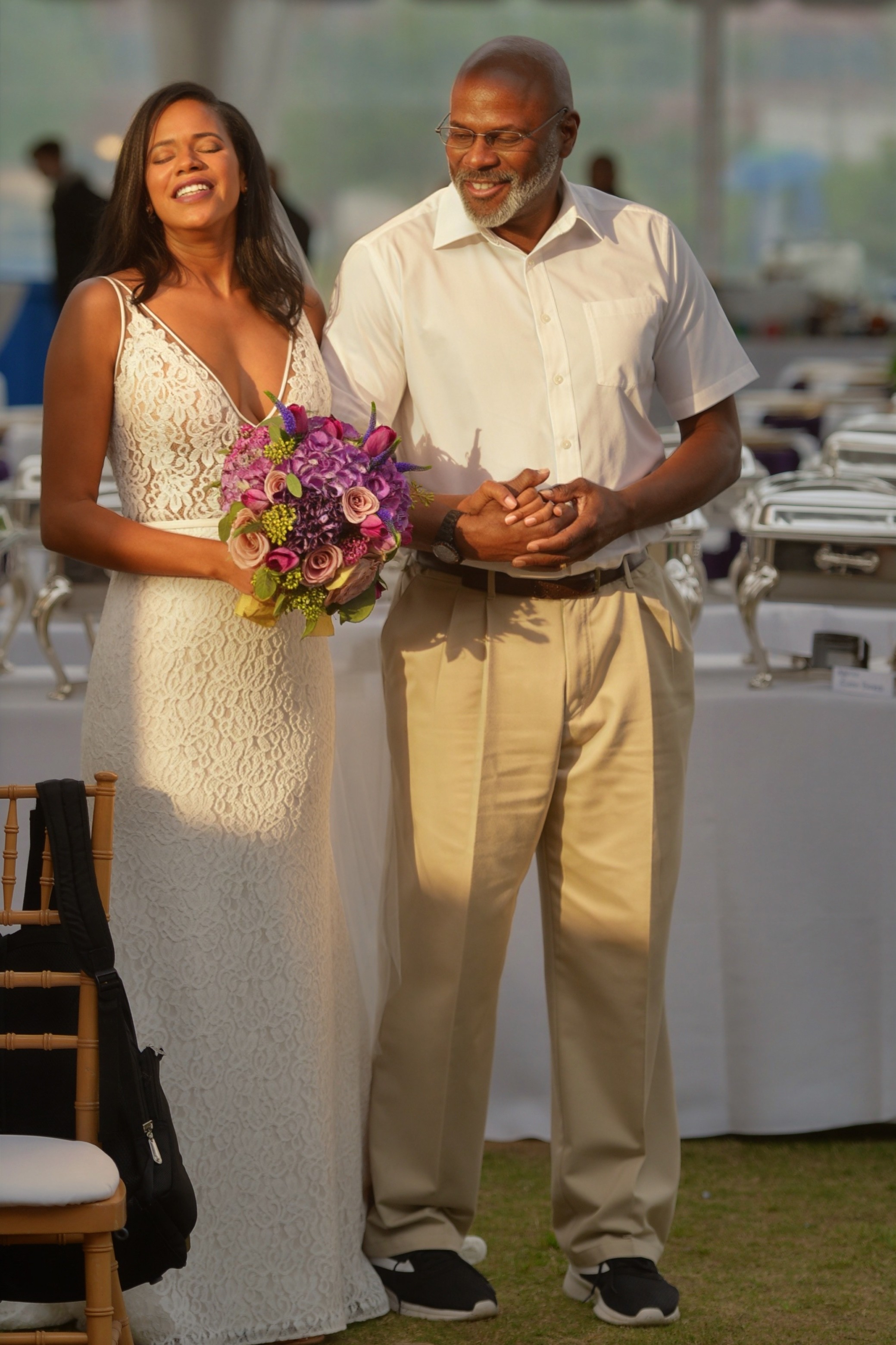 Bride walks in with her father at golden hour during her Atlanta wedding — Atlanta wedding photographer