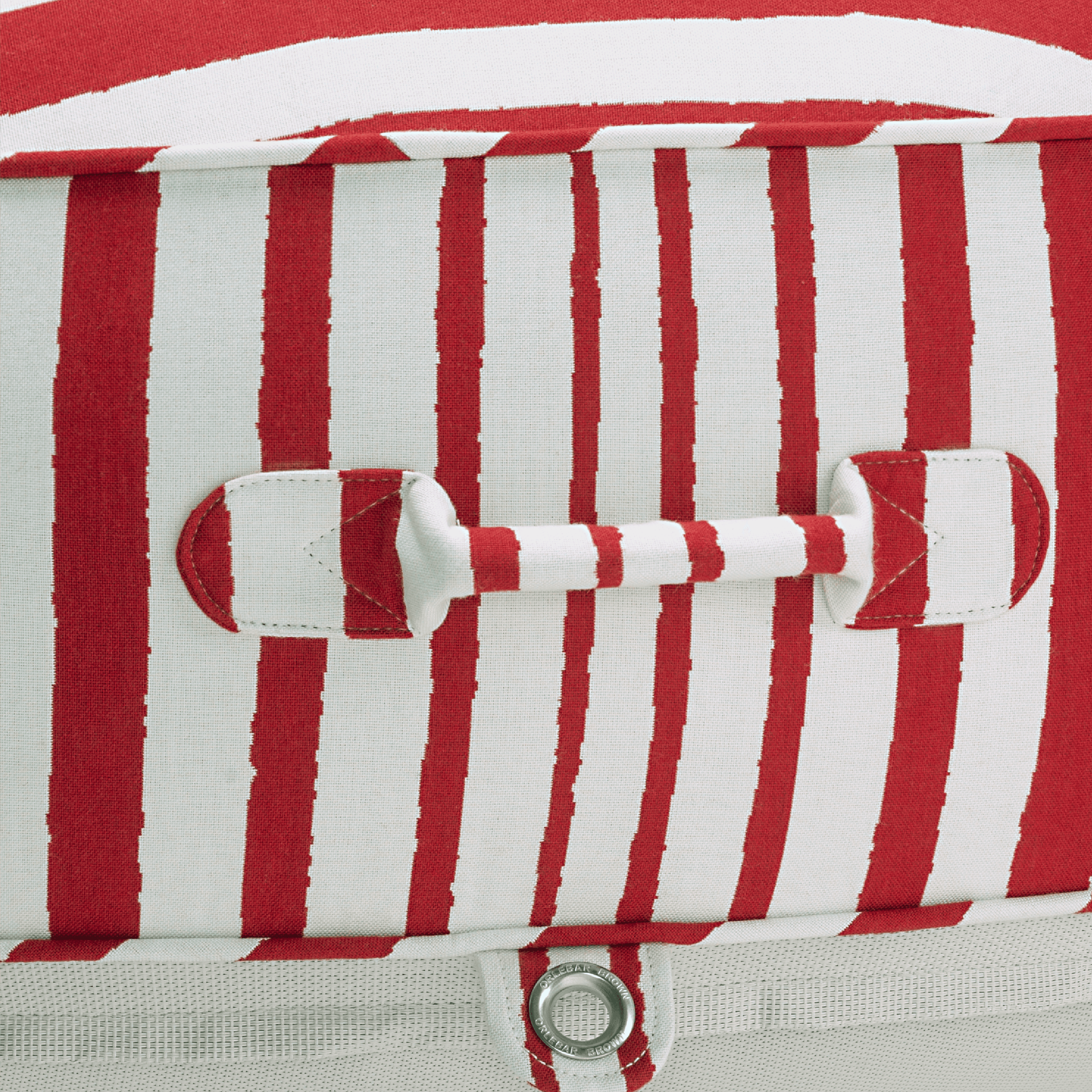 Close-up of pool float showing multi-colour canvas handle, co-branded eyelet, and topstitched seams
