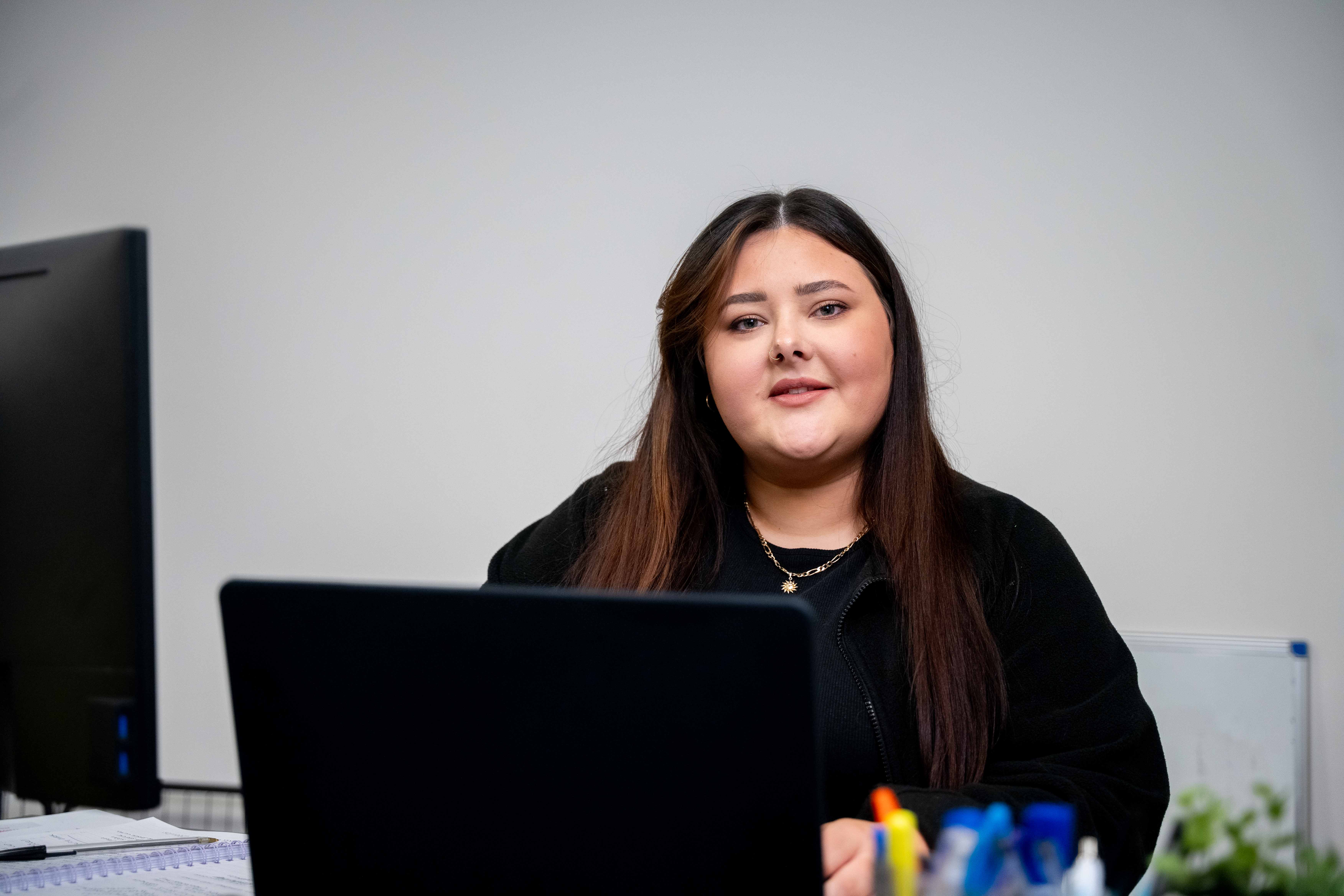 a portrait of an office worker