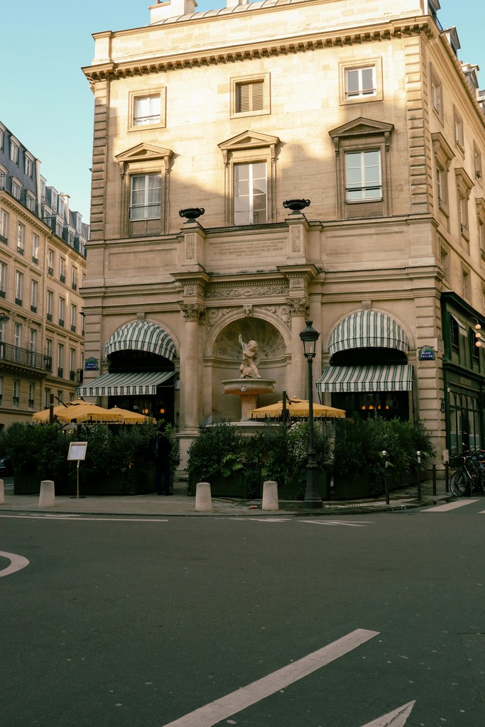 A large building with a clock on the top of it