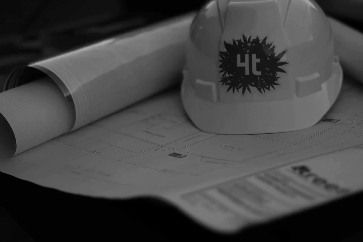 4trees cannabis building hard hat and blueprint