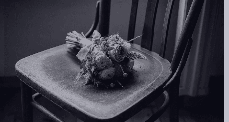 Wedding flowers resting on chair