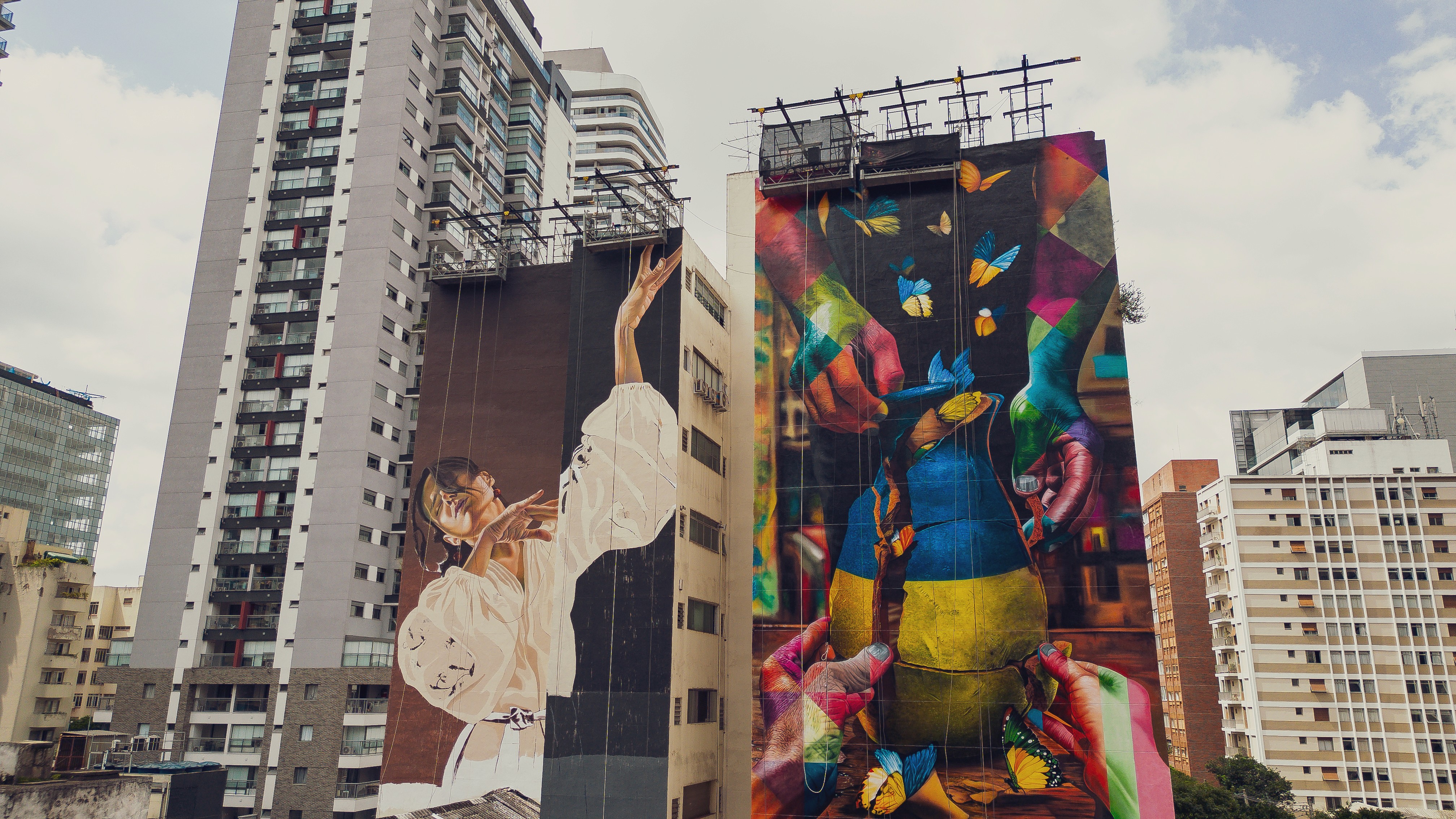 Woman wears a blue coat in a blue environment.