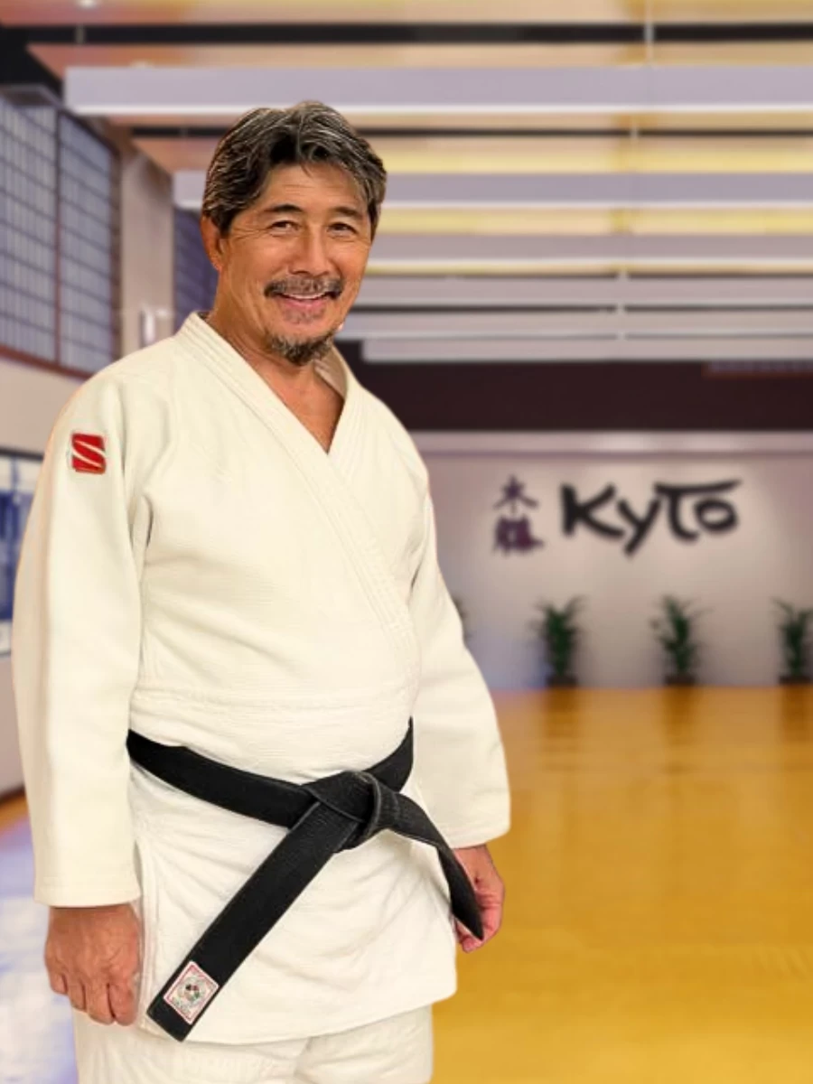 Two Brazilian Jiu-Jitsu students practicing ground techniques.
