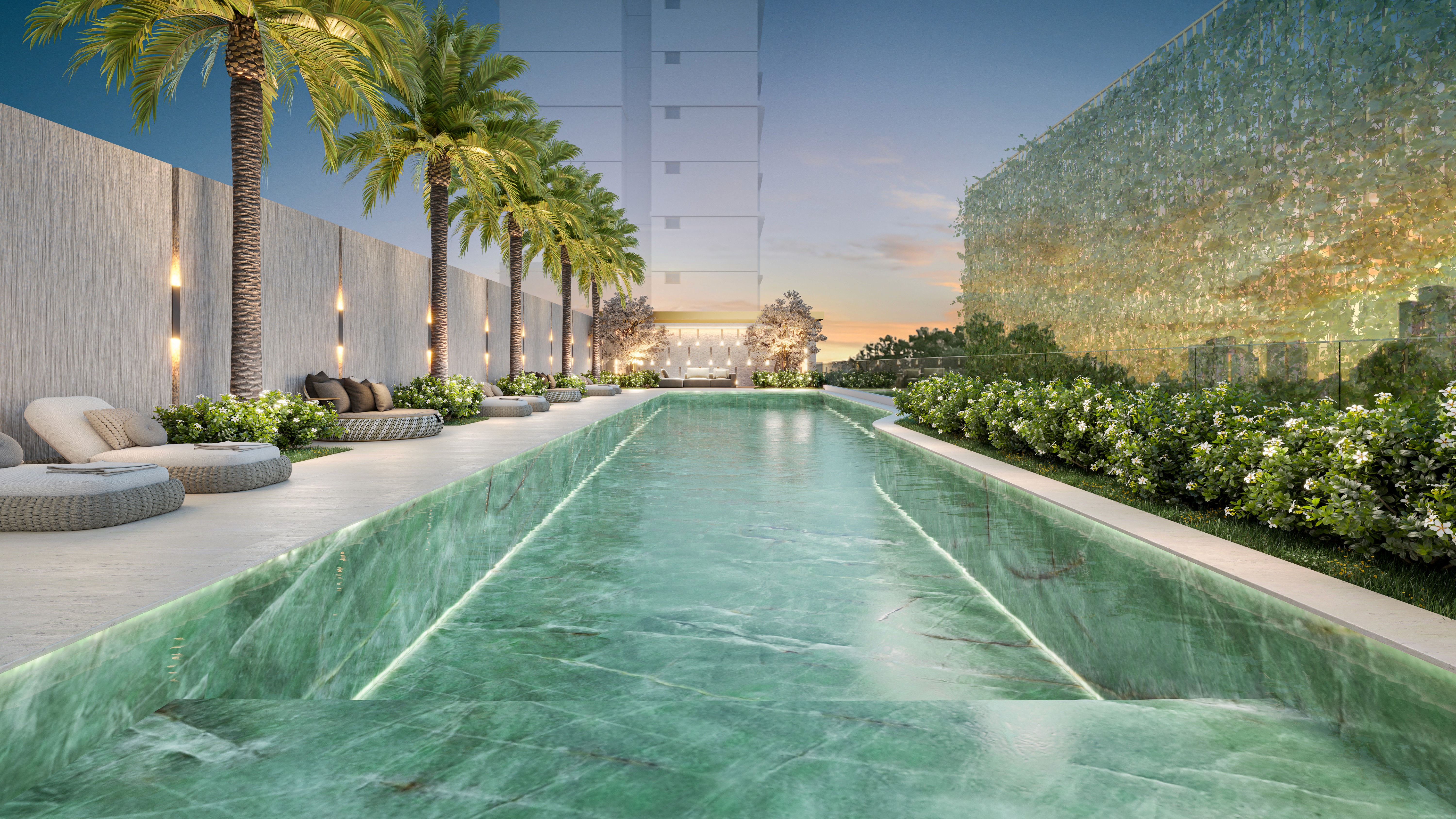 Curved modern skyscraper against a clear blue sky.