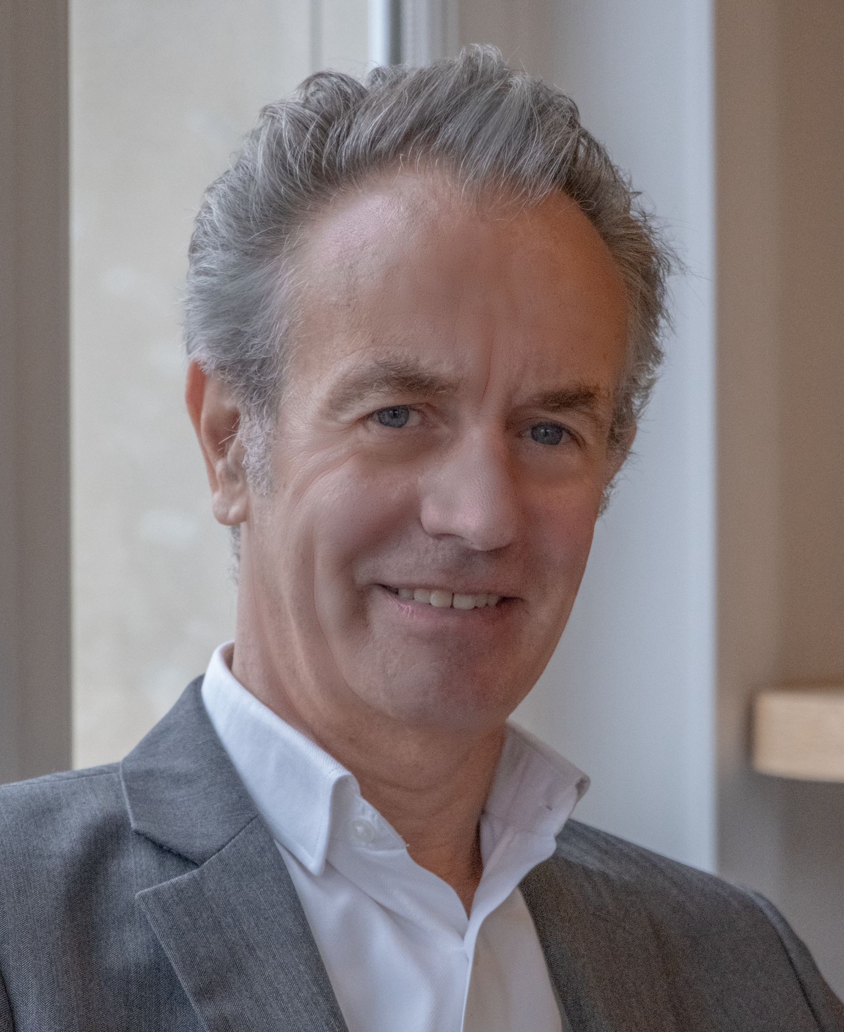 A surreal portrait of a person in motion, with light streaks and a blurred effect creating a dynamic and artistic vibe.