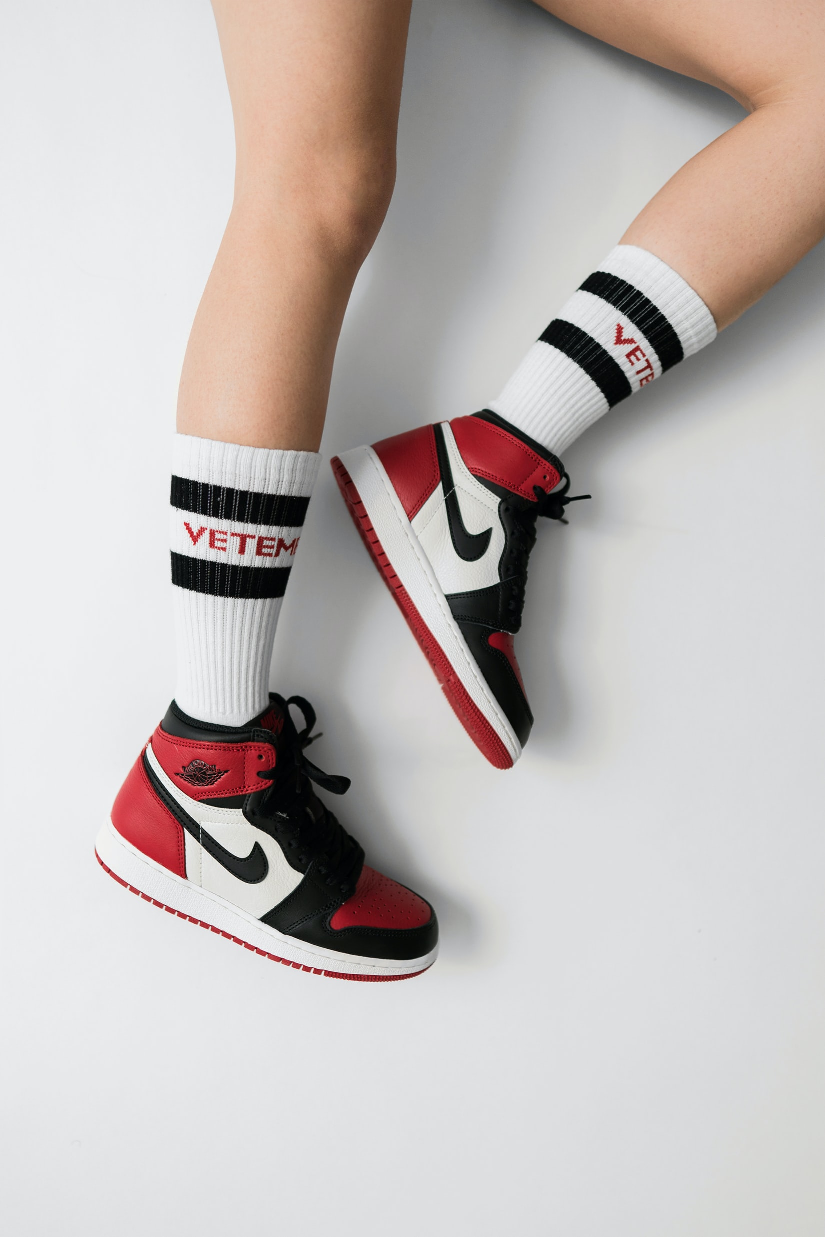 Person weating black toe air jordans