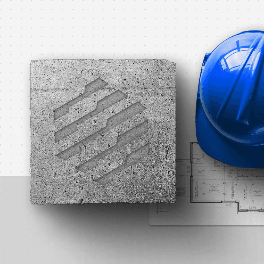 Neukonzept logo embossed on a block of cement