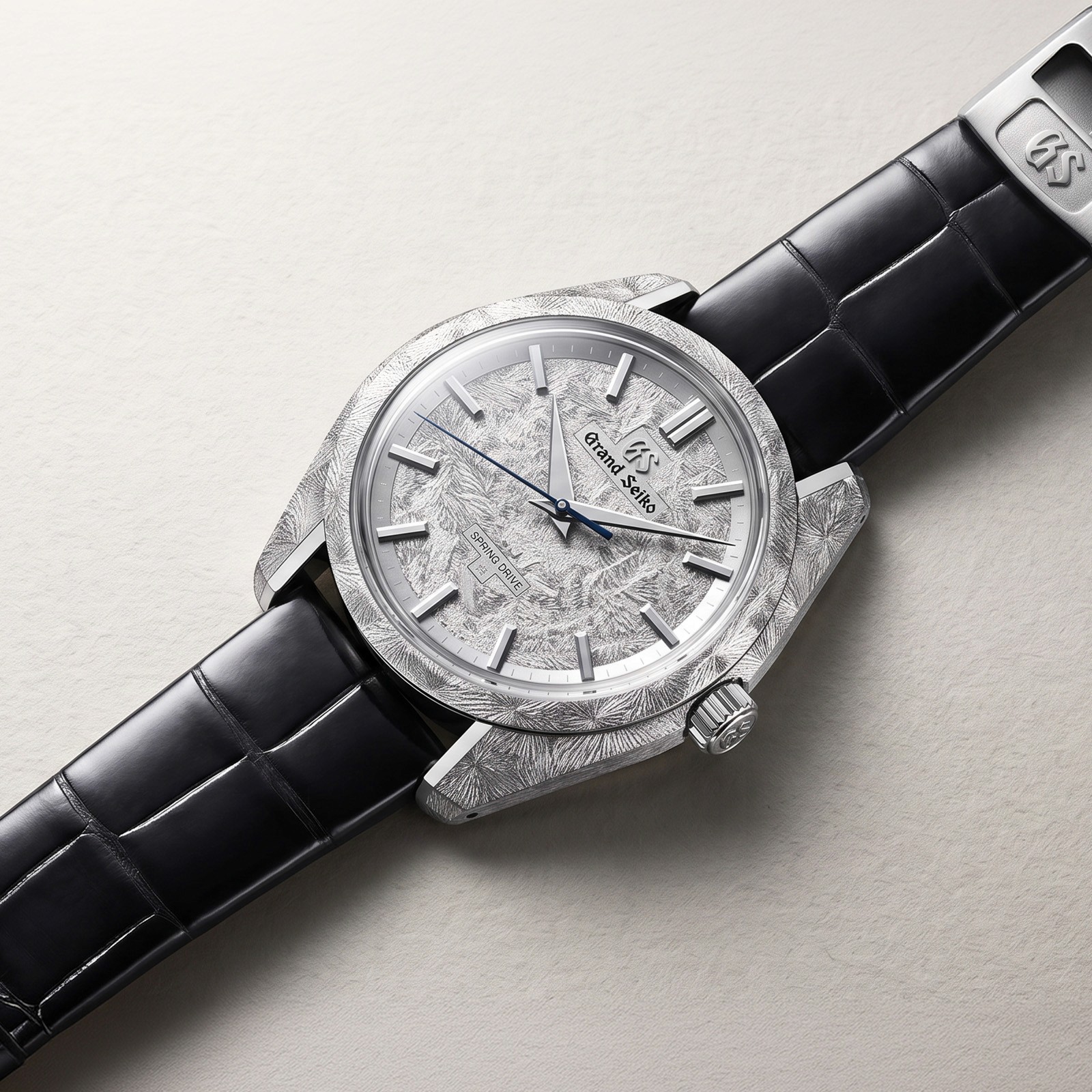 Silver and black chronograph watch